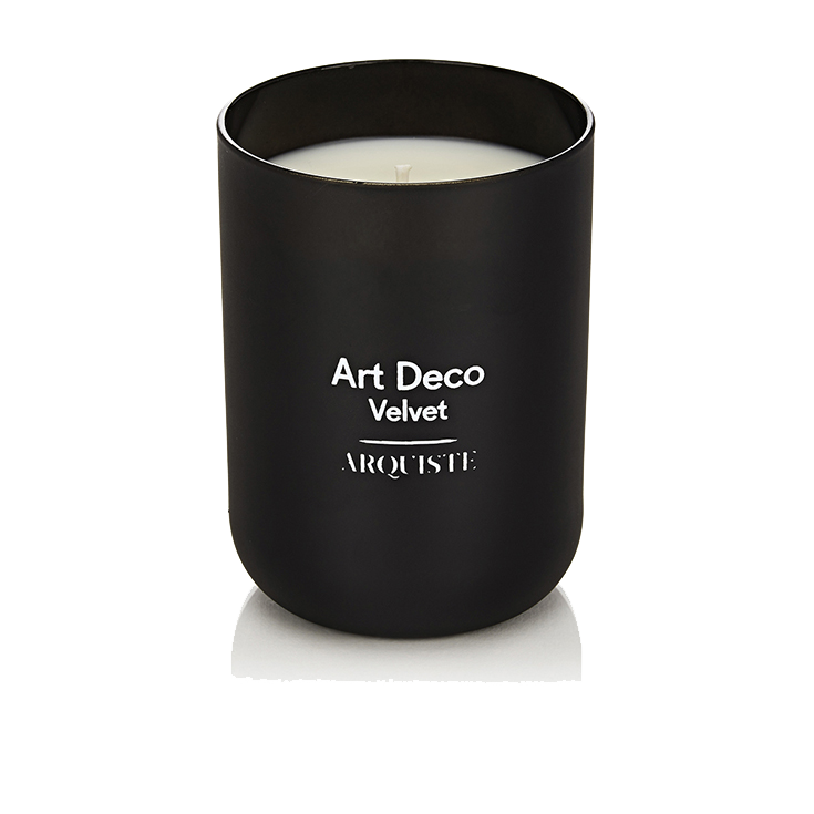 Black candle with 'Art Deco Velvet Arquiste' branding on a white background