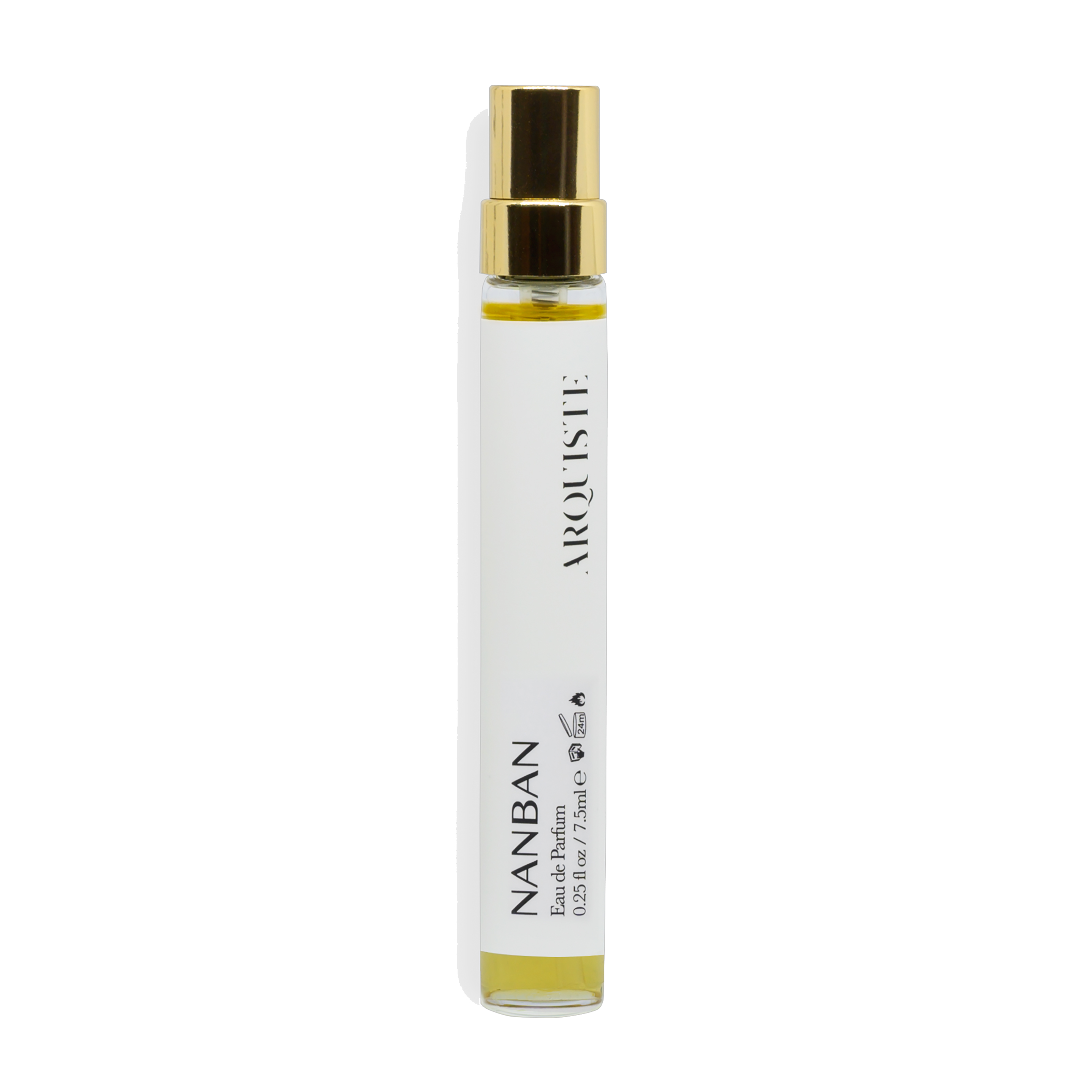 Nanban travel spray with gold cap and white label on a white background