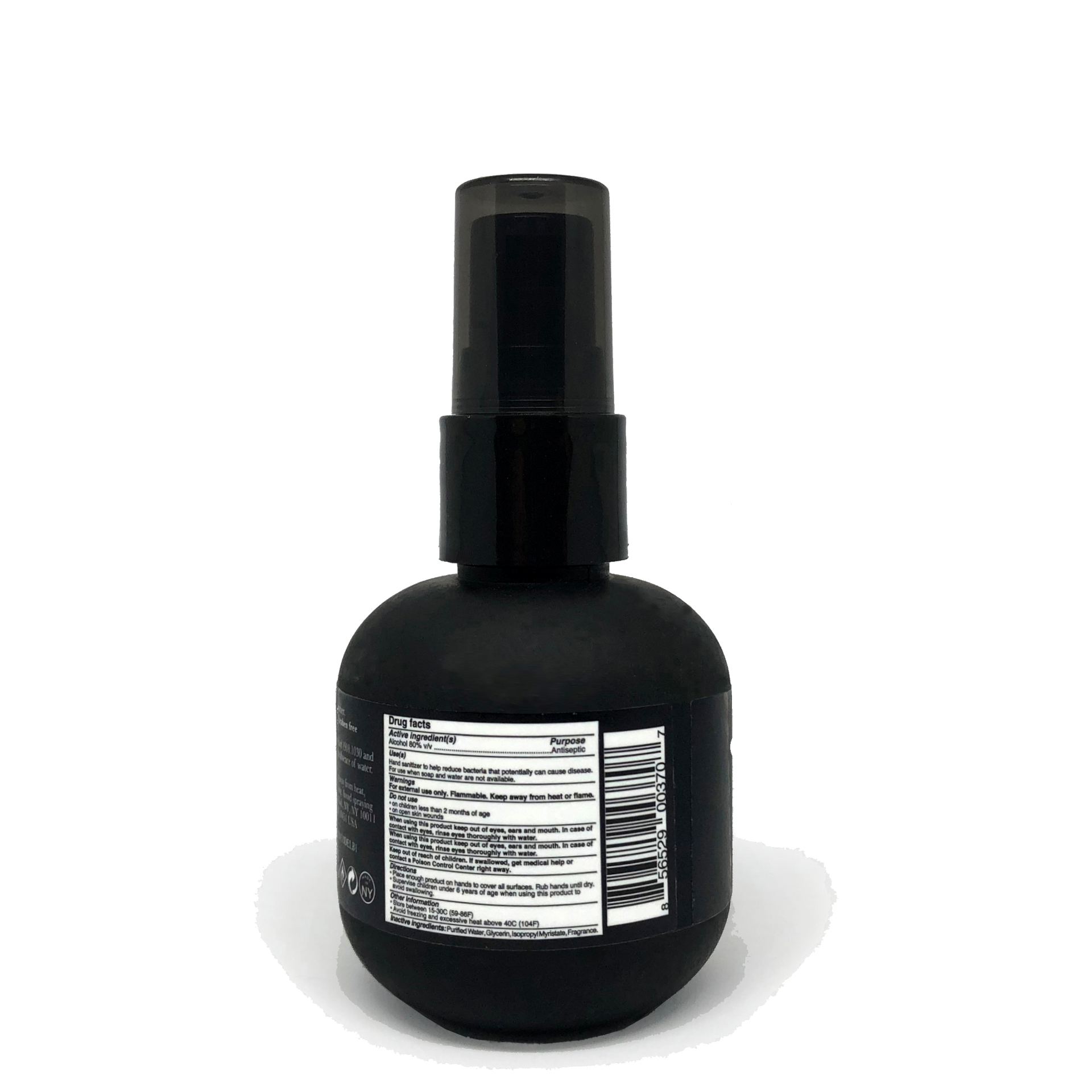 Black spray bottle with a label on a white background