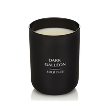 Load image into Gallery viewer, Black candle with &#39;Dark Galleon Arquiste&#39; branding on a white background