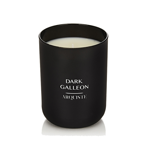 Black candle with 'Dark Galleon Arquiste' branding on a white background