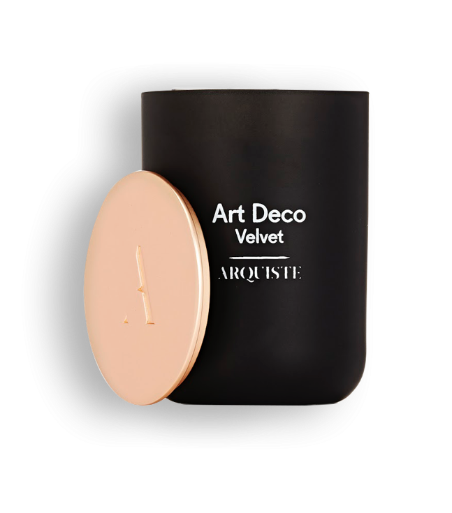 Black candle with rose gold lid with 'Art Deco Velvet Arquiste' branding on a white background
