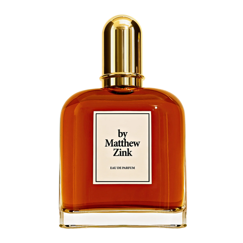 Perfume bottle with gold cap and 'by Matthew Zink' label on a white background