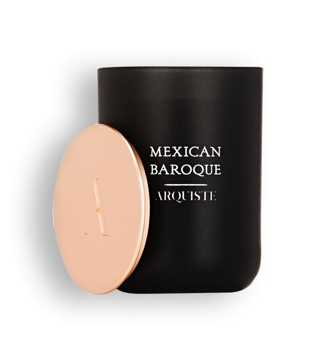 Black candle with a rose gold lid with 'Mexican Baroquie Arquiste' branding on a white background